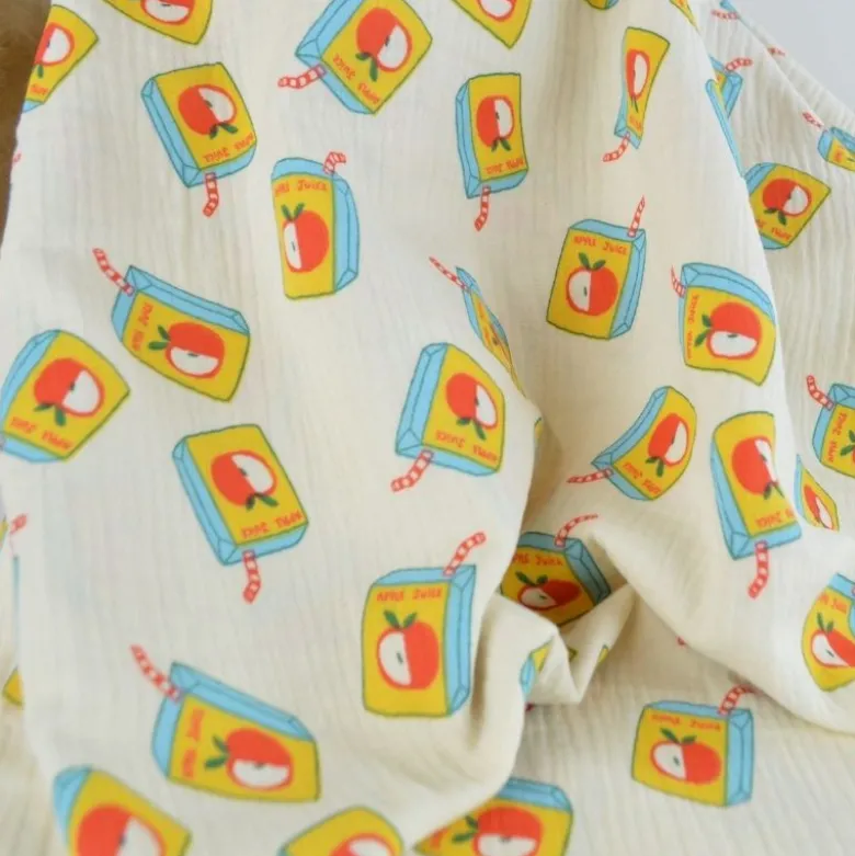 Tissu double gaze de coton Juice motif briques de jus de pomme