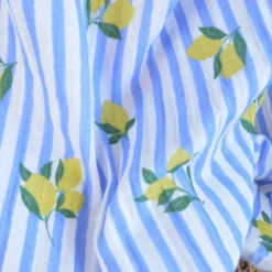 Tissu double gaze de coton Limoncello motif citrons et rayures bleues