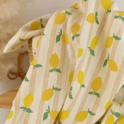 Tissu double gaze de coton Lime motif citrons et rayures fond écru