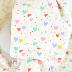Tissu double gaze de coton Tiamo motif coeurs fond écru
