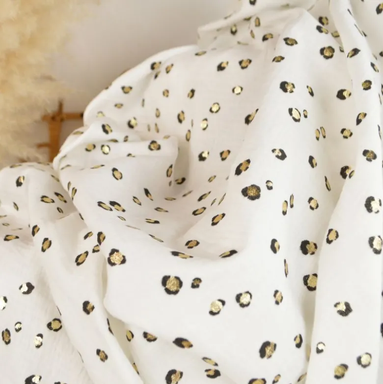 Tissu double gaze Maureen imprimé léopard doré – fond blanc cassé