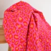 Tissu double gaze motif léopard fuchsia et orange - OEKO TEX