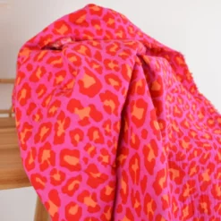 Tissu double gaze motif léopard fuchsia et orange - OEKO TEX