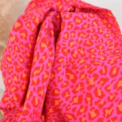Tissu double gaze motif léopard fuchsia et orange - OEKO TEX