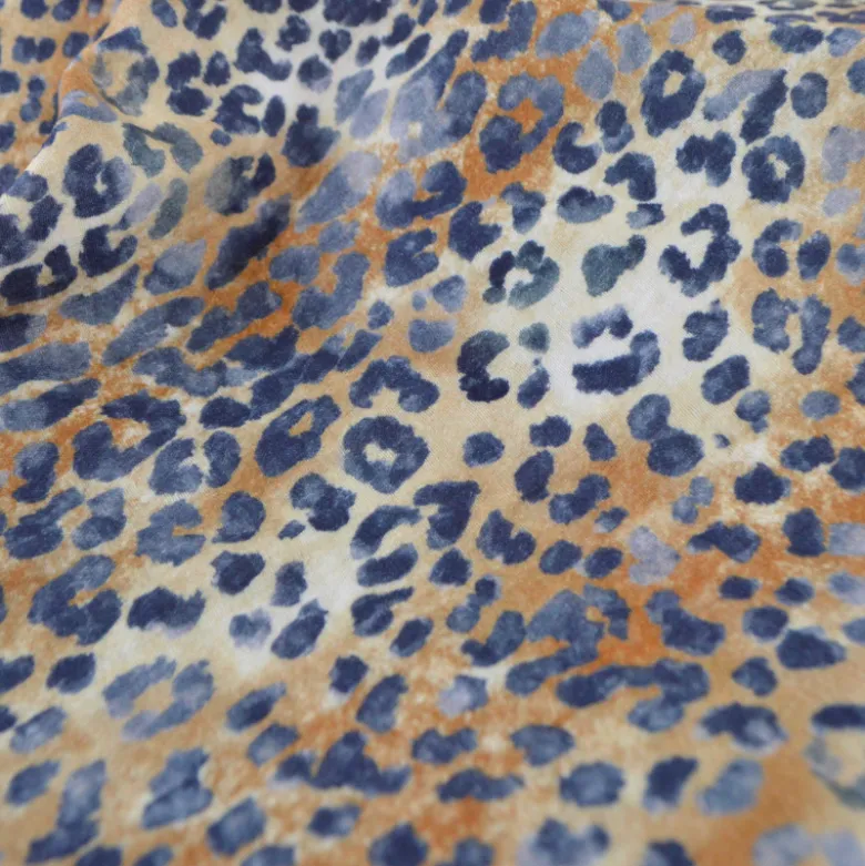 Tissu double gaze motif léopard Sable et bleu marine