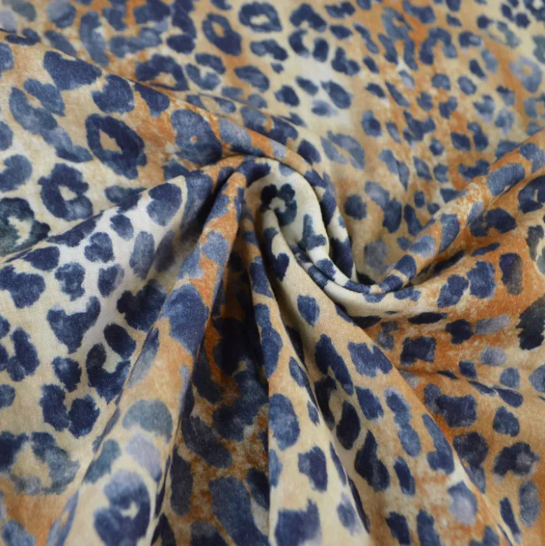 Tissu double gaze motif léopard Sable et bleu marine