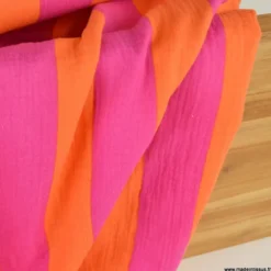 Tissu double gaze motif rayures orange et fuchsia - OEKO TEX