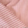 Tissu Double gaze réversible à rayures Skin et Paprika - OEKO TEX