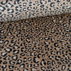 Tissu doudou ultra doux imprimé léopard sur fond crème