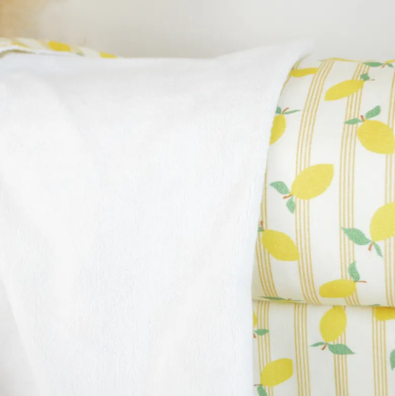 Tissu Eponge de coton monoface Lime motif citrons fond écru