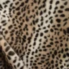 Tissu fausse fourrure rabbit Guepard noir fond Galet