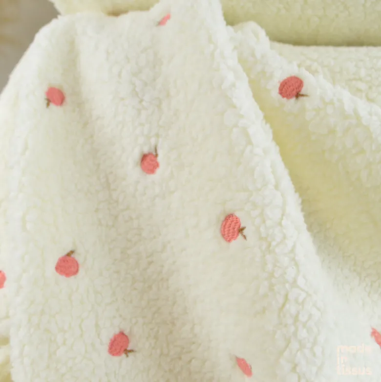 Tissu Fausse Fourrure Sherpa brodée pêches - Ecru