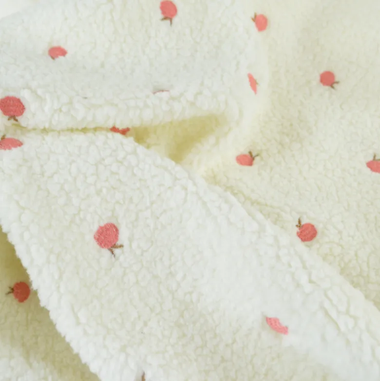 Tissu Fausse Fourrure Sherpa brodée pêches - Ecru