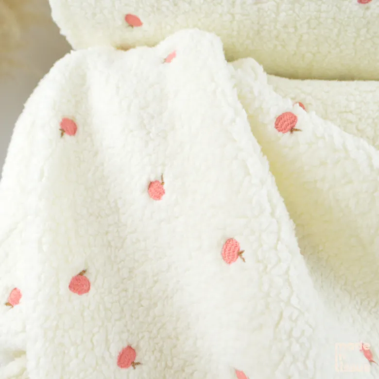 Tissu Fausse Fourrure Sherpa brodée pêches - Ecru