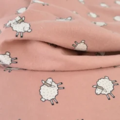 Tissu flanelle de coton Poppy motif moutons fond vieux rose