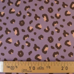 Tissu French Terry coton – Motif léopard fond parme - OEKO TEX
