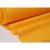 Tissu Gabardine enduite étanche jaune Bouton d'Or