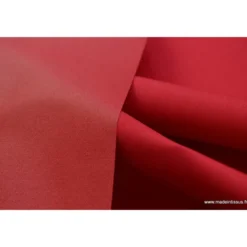 Tissu Gabardine enduite étanche rouge.
