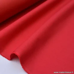 Tissu Gabardine enduite étanche rouge.