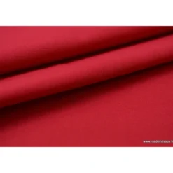 Tissu Gabardine enduite étanche rouge.