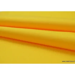 Tissu Gabardine enduite étanche jaune.