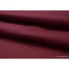 Tissu Gabardine enduite étanche bordeaux.