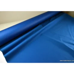 Tissu Gabardine enduite étanche pétrole.