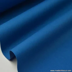 Tissu Gabardine enduite étanche pétrole.