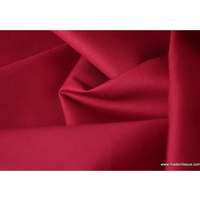 Tissu Gabardine enduite étanche rouge hermès.
