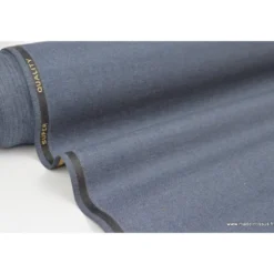 Tissu gabardine polyester viscose enduite étanche jean.