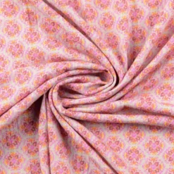 Tissu gaufré en coton motifs floraux graphique roses