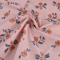 Tissu imperméable Alina type ciré de pluie motif fleurs fond Nude
