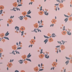 Tissu imperméable Alina type ciré de pluie motif fleurs fond Nude