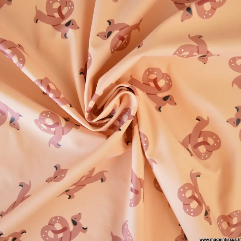 Tissu imperméable Alsachien type ciré motif bretzel chiens