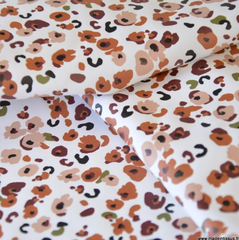 Tissu imperméable Ebbie type ciré motif léopard fond écru