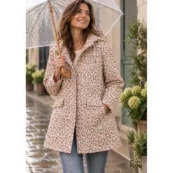 Tissu imperméable Ebbie type ciré motif léopard fond écru
