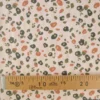 Tissu imperméable Felyna type ciré motif léopard Graou fond écru