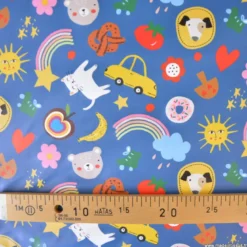 Tissu imperméable Funpets type ciré motif animaux fond bleu