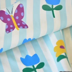Tissu imperméable Hypolite type ciré de pluie motif fleurs et rayures