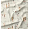 Tissu imperméable Ilapio type ciré motif lapins fond écru