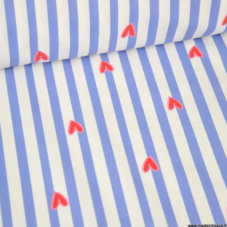 Tissu imperméable Suzette type ciré de pluie motif coeurs et rayures bleues