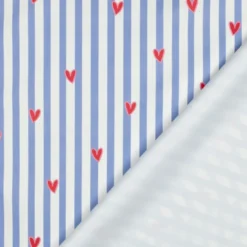 Tissu imperméable Suzette type ciré de pluie motif coeurs et rayures bleues