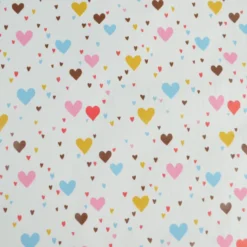 Tissu imperméable Tiamo type ciré de pluie motif coeurs bleus et roses