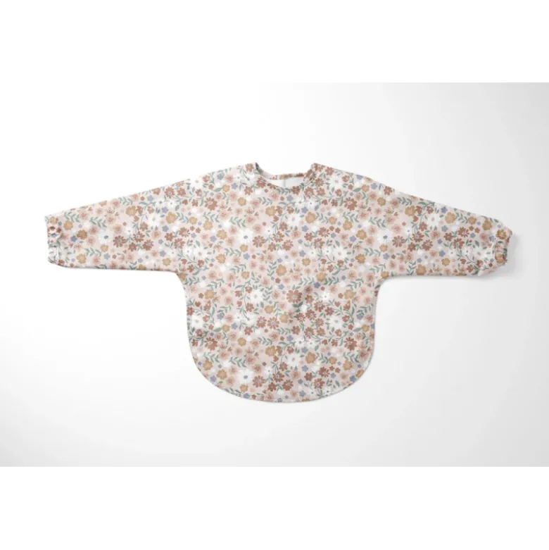 Tissu imperméable type ciré motif fleurs fond rose clair