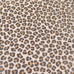 Tissu imperméable type ciré motif léopard fond écru
