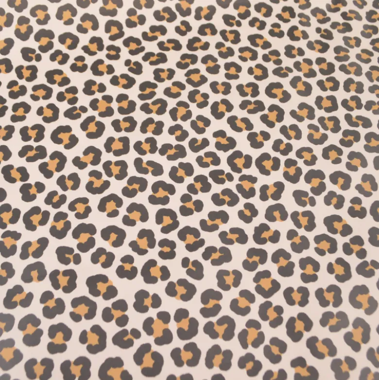 Tissu imperméable type ciré motif léopard fond écru