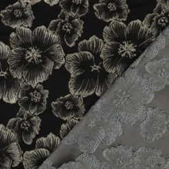 Tissu jacquard Habillement fleuri noir irisé