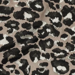 Tissu jacquard Habillement Leopard noir et doré fond beige