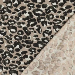 Tissu jacquard Habillement Leopard noir et doré fond beige
