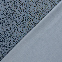 Tissu Jean fin motif Léopard doré fond bleu
